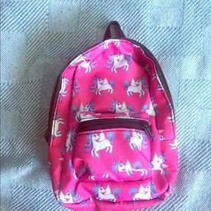 Tiny unicorn backpack